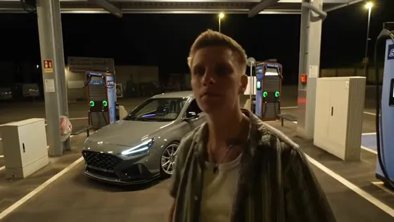 The cards drop and the parked car comes into view.